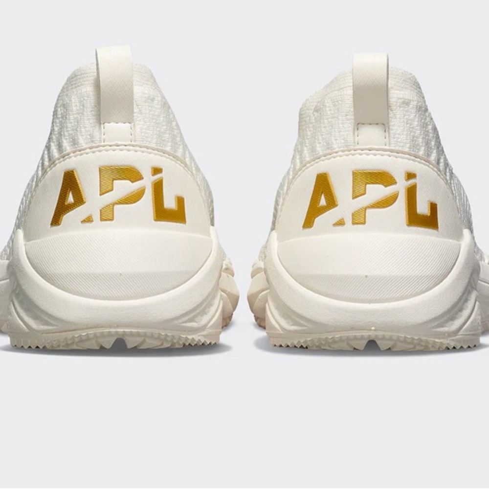 APL Women's TechLoom Traveler
Ivory / Metallic Gold Size 8. Worn once indoors